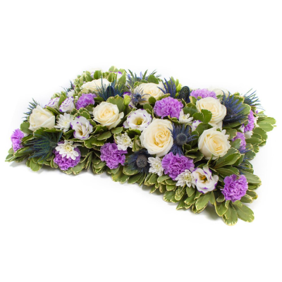 Pillow SYM-331 - Signifying a final, comfortable resting place, this open based 46cm pillow uses lilac and white flowers to create a beautiful tribute.